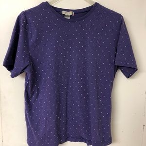 Claudia Barnes purple shirt